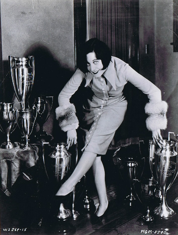 1926 MGM publicity, with dance trophies.