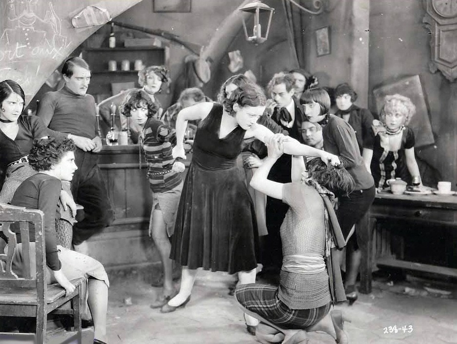 1926. A film still from 'Paris.' Douglas Gilmore at left.