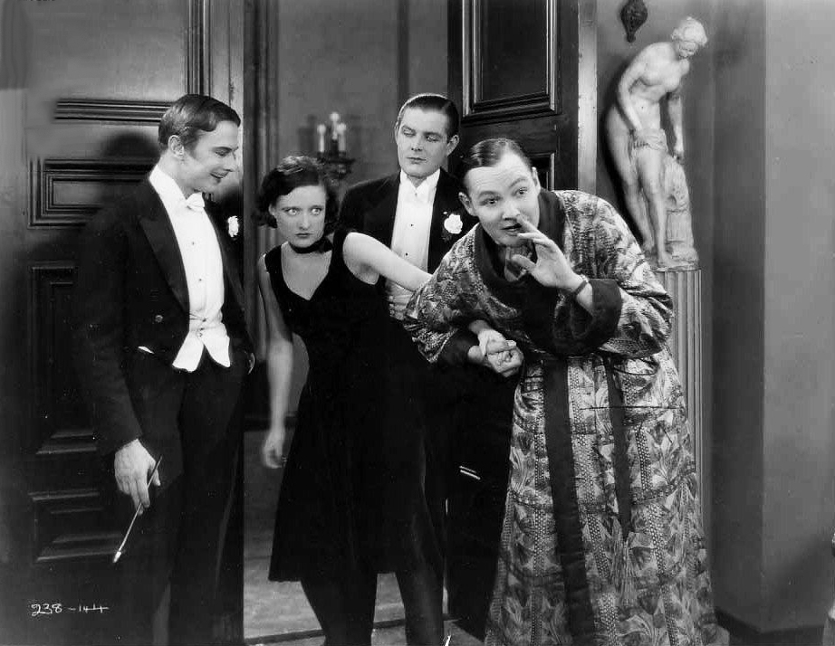 1926. With Charles Ray (right) in 'Paris.'