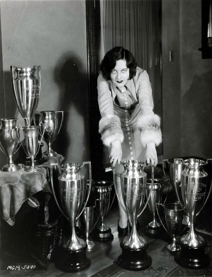 Late 1926. With dance-contest trophies.