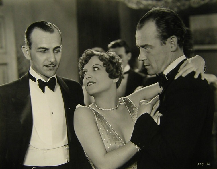 1928. 'Four Walls.' With Louis Natheaux, left.