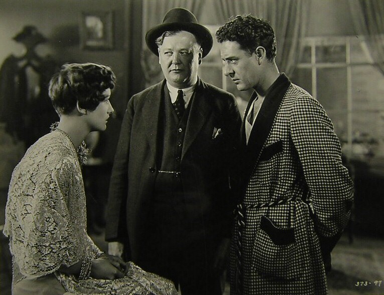 1928. 'Four Walls.' With John Gilbert, right.