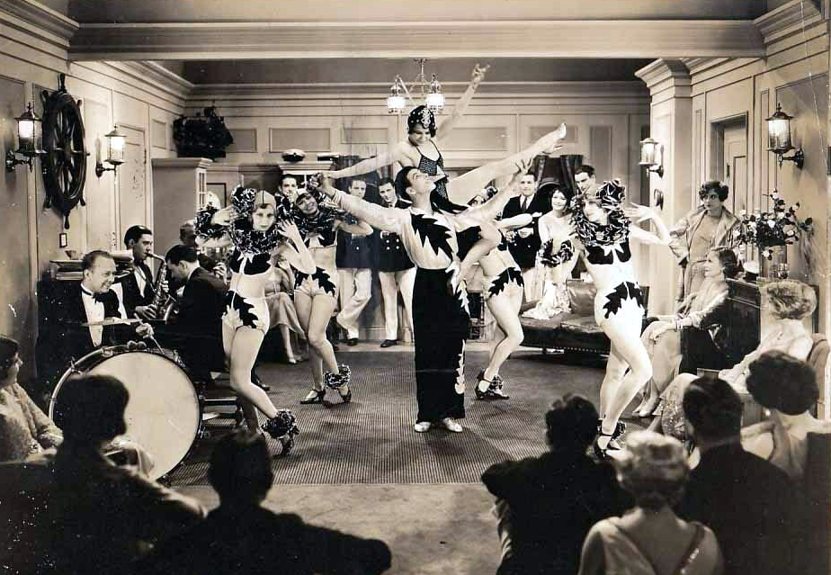 1928. 'Our Dancing Daughters.' Joan at doorway at right.