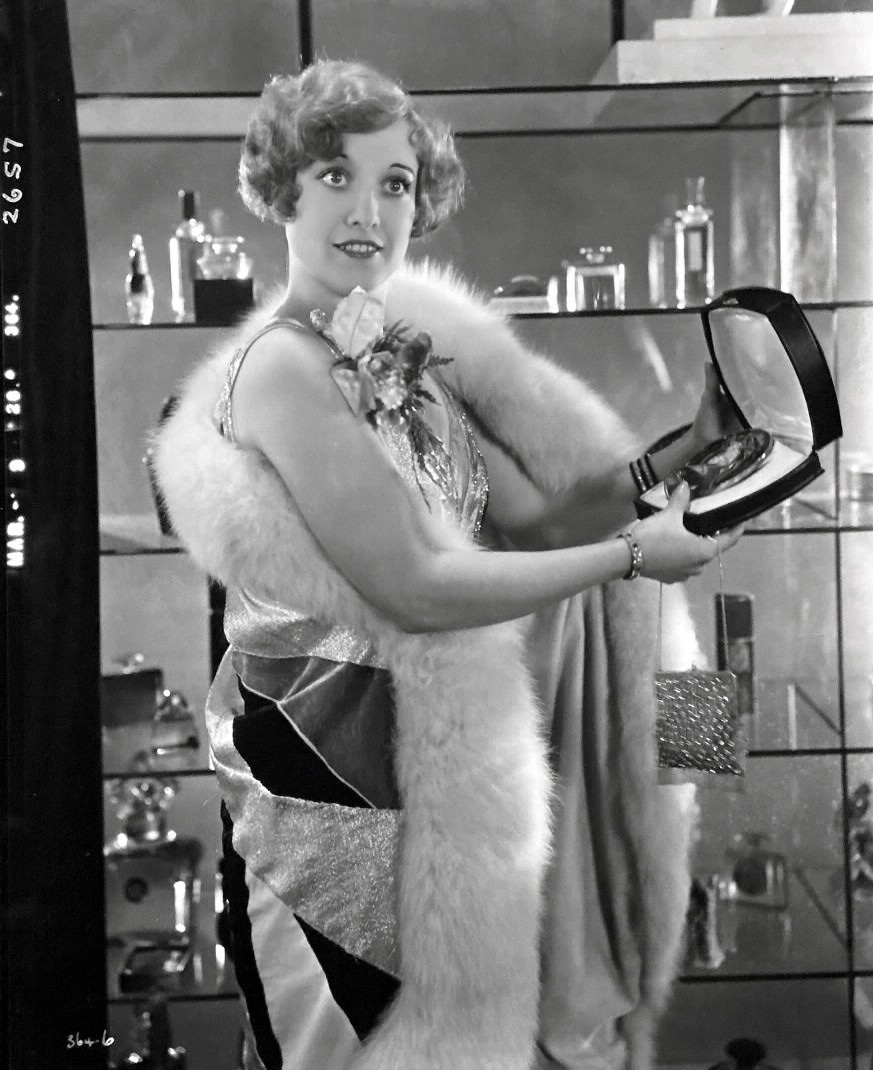 1928. 'Our Dancing Daughters' film still. (Note the date shot at left border.)