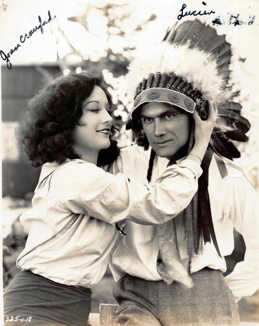 1928. On the set of 'Rose-Marie' with director Lucien Hubbard.