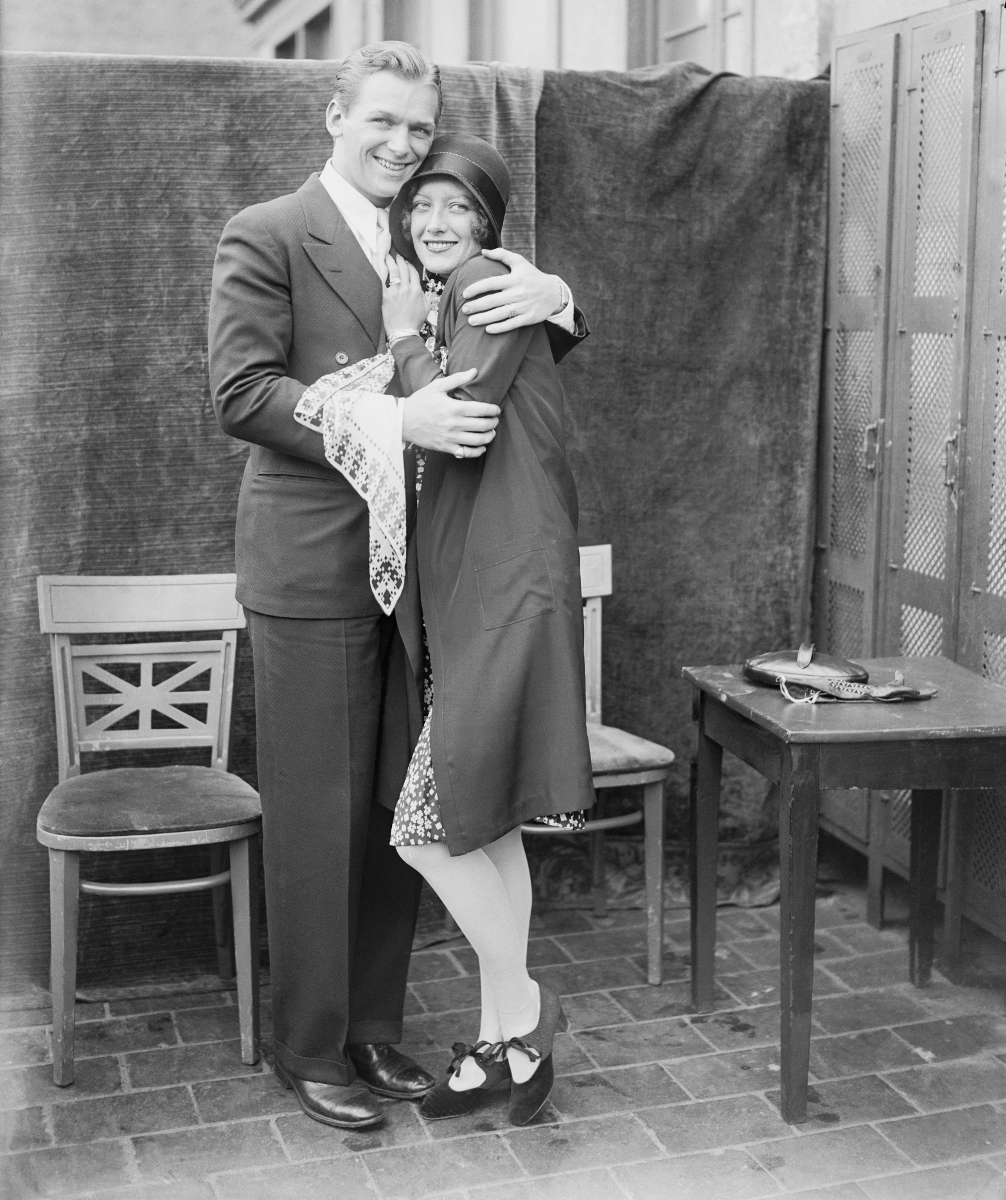 6/3/29. Newly married to Doug Fairbanks, Jr. Atop the Algonquin Hotel in NYC.