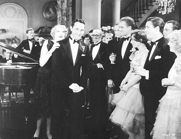 Joan with Gwen Lee and William Haines (latter two to far left).