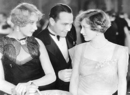 In '29's 'Duke Steps Out.' (From left: Lee, William Haines, Joan.)