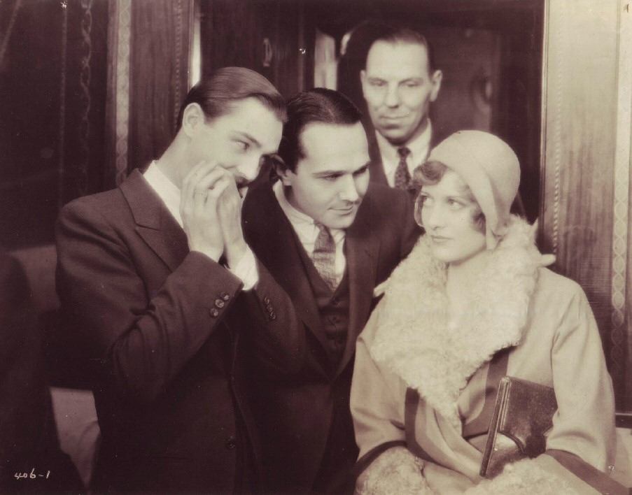 1929. 'The Duke Steps Out.' With William Haines, center.