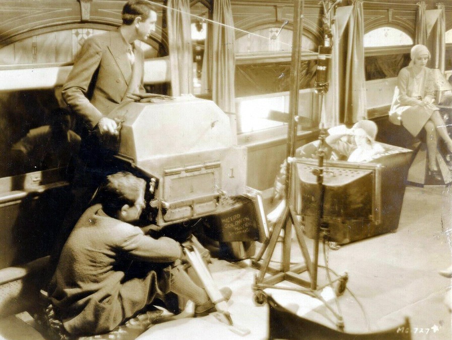 1930. On the set of 'Montana Moon' with director Malcolm St. Clair (top).