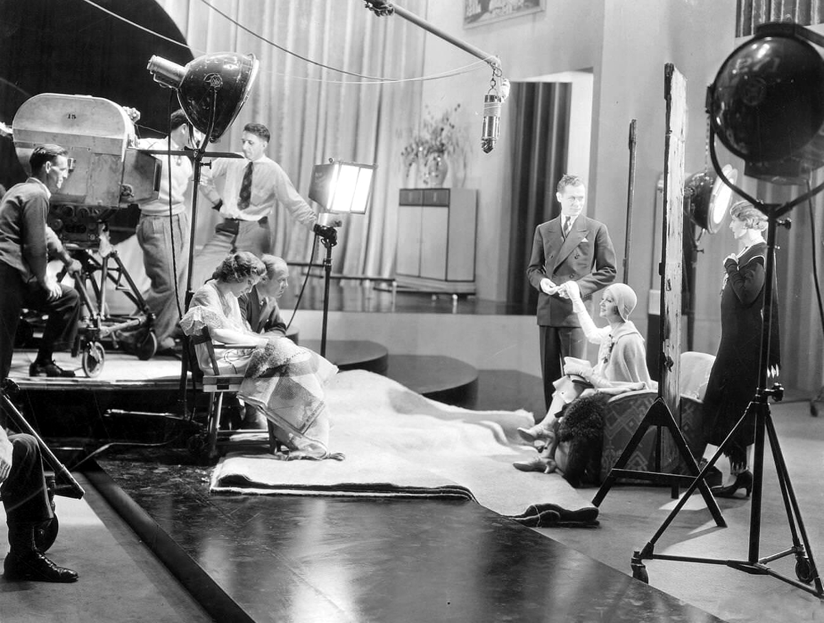 1930. On the set of 'Our Blushing Brides.'