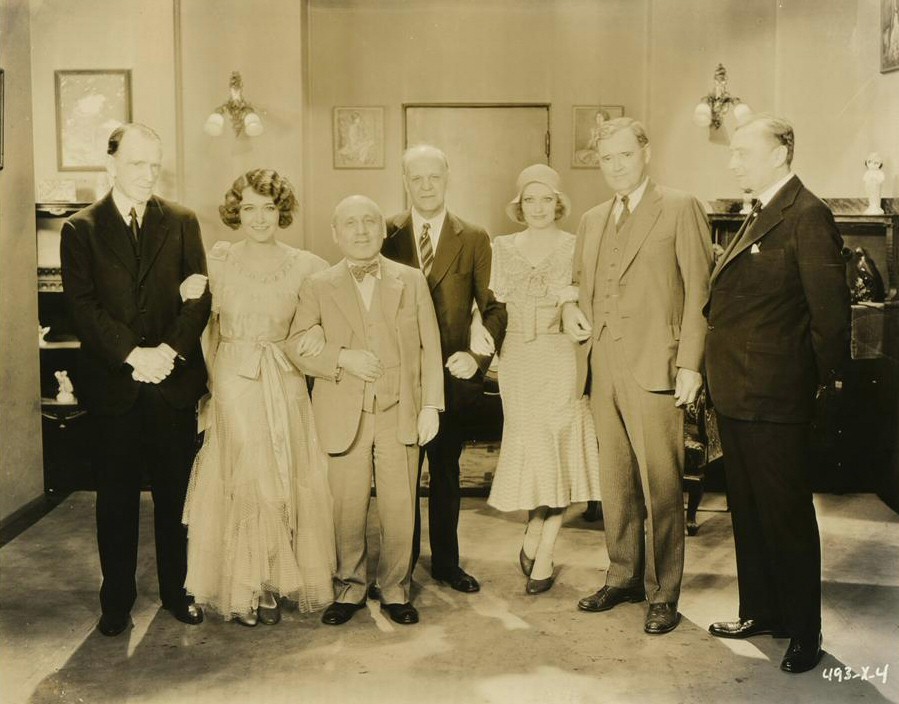 1930. On the set of 'Our Blushing Brides' with Dorothy Sebastian and guests.