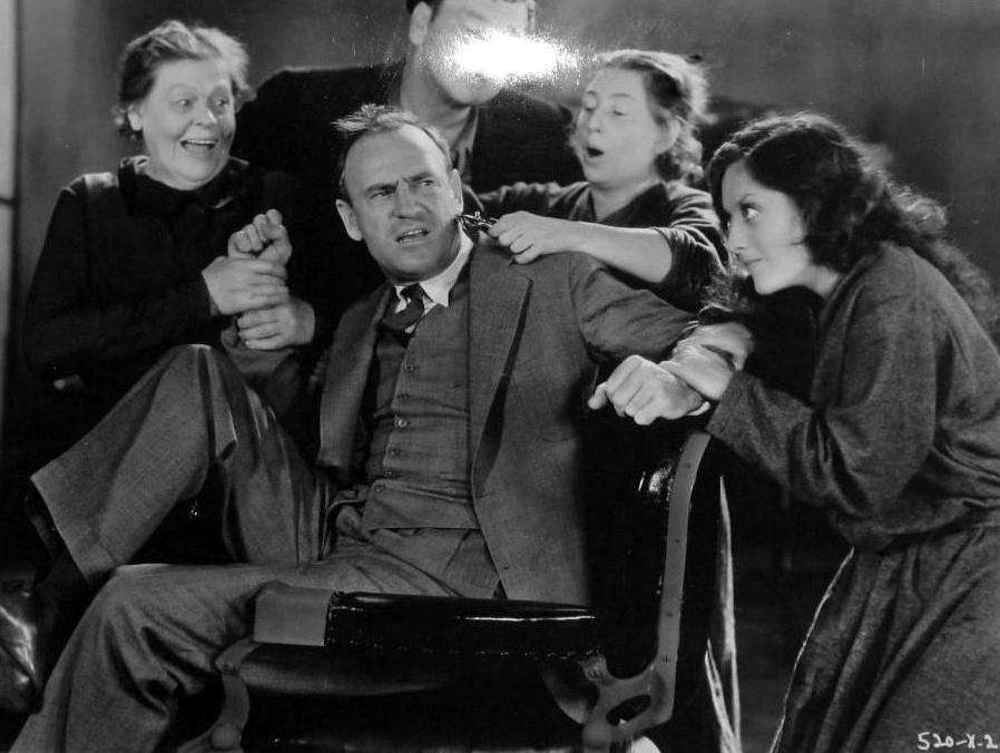 1930. Joke shot on the set of 'Paid' with director Sam Wood, Marie Dressler, Wallace Beery, Polly Moran.