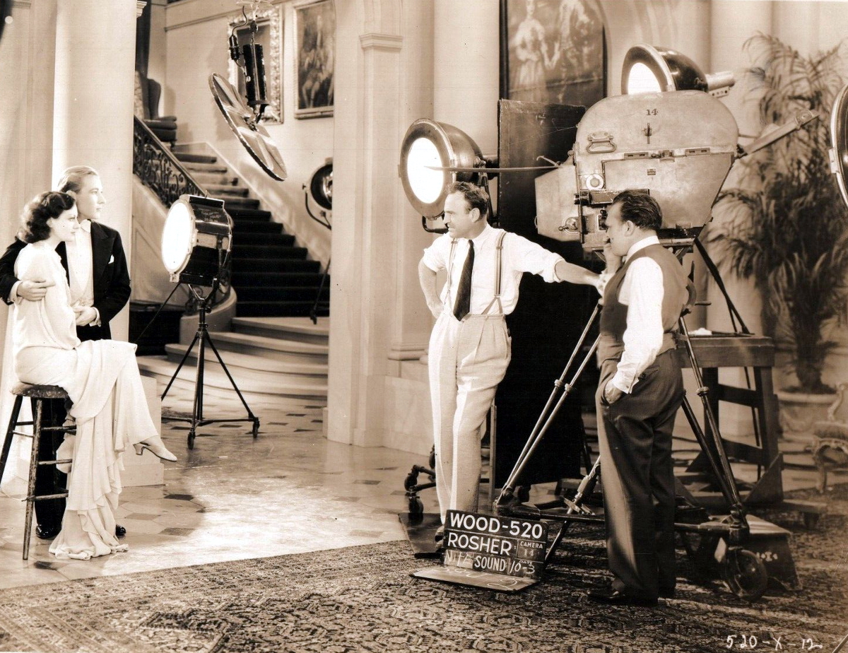 1930. On the set of 'Paid' with Kent Douglass and director Sam Wood.