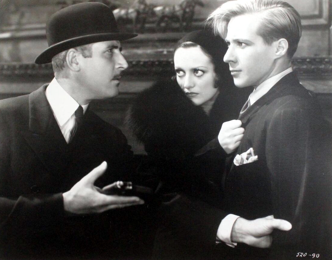 1930. 'Paid.' With John Miljan (left) and Kent Douglass.