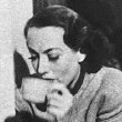 1935. Six shots drinking coffee from a 'Screen Romances' page. Shot by Frank Muto.