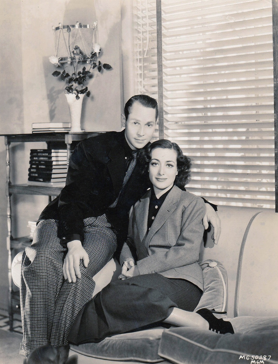 1936. Joan and Franchot at home.