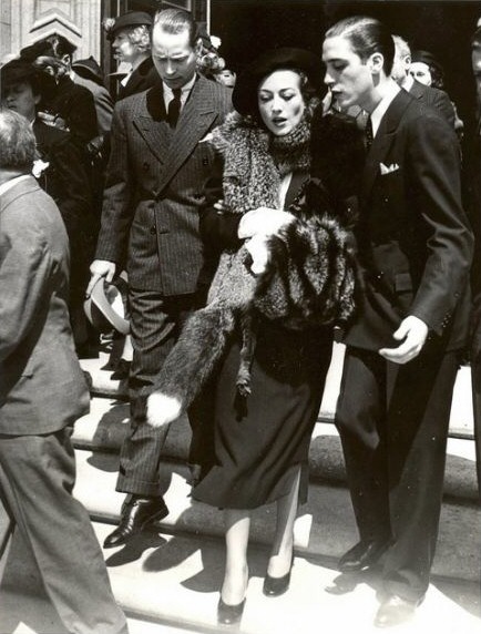 Circa 1933, with Franchot Tone at left.