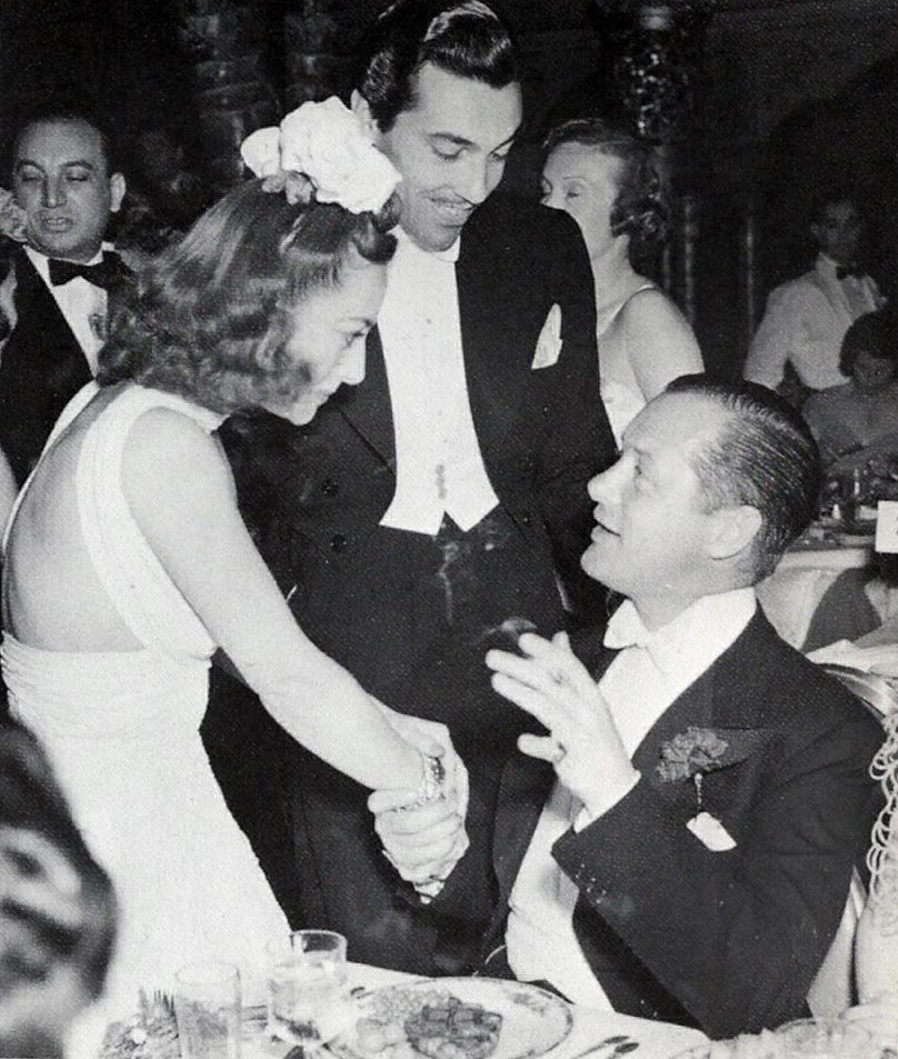 1937 with Cesar Romero and Robert Montgomery.