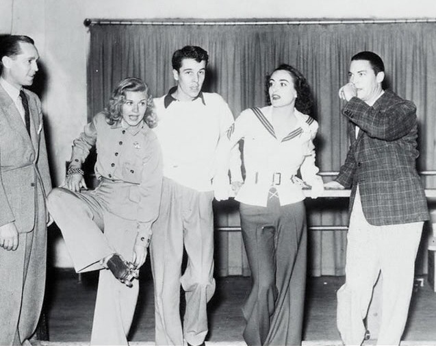 1935. At the Culver City Rollerdome with Franchot Tone, Ginger Rogers (her party), Alfred Vanderbilt, Jr., and Chester Morris.