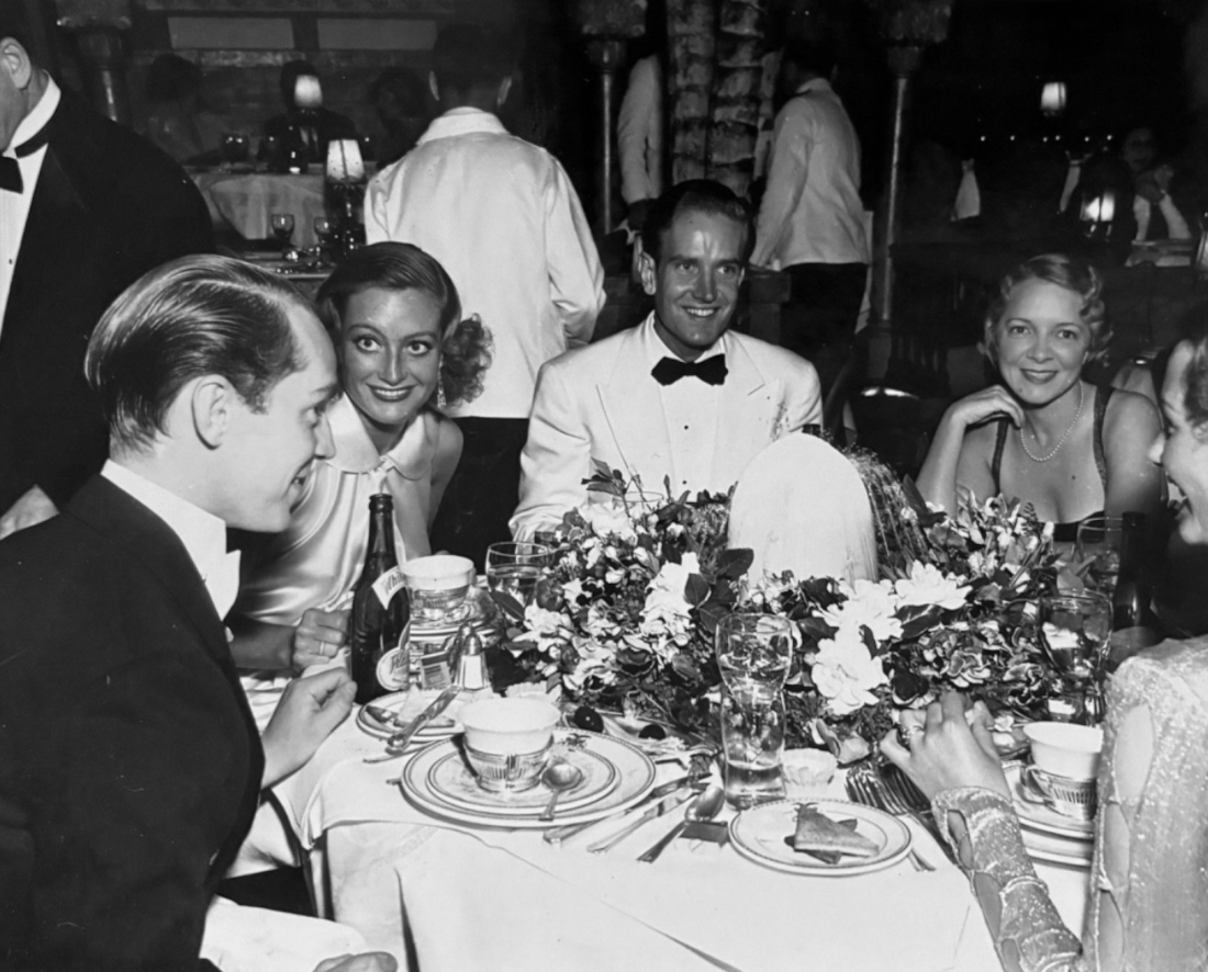 June 1933. At the Stork Club with Franchot Tone (left) and Helen Hayes.