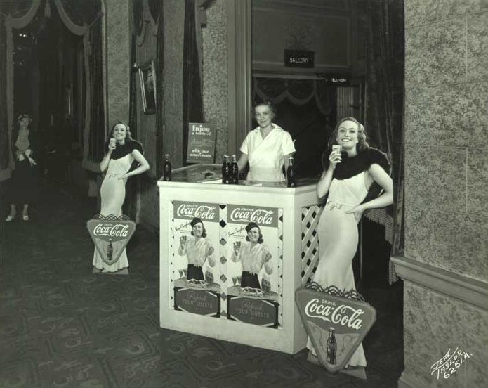 1933. Joan cardboard cutouts at a Wisconsin movie theater.