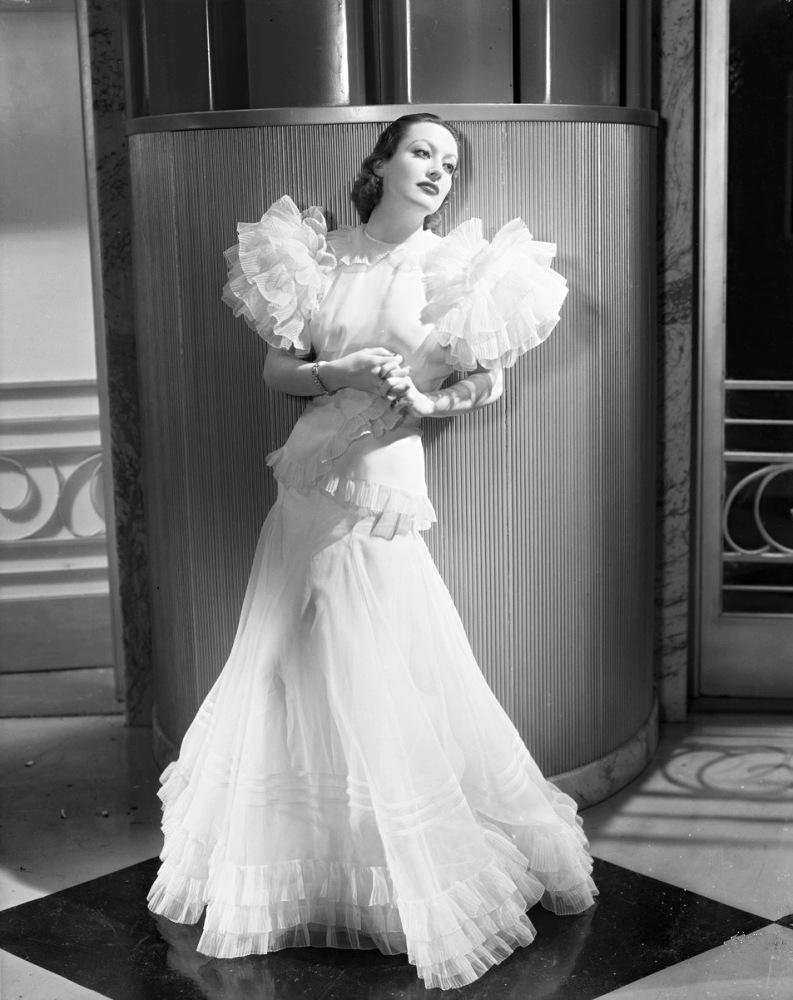 1932. Publicity for 'Letty Lynton' shot by Hurrell. Dress by Adrian.