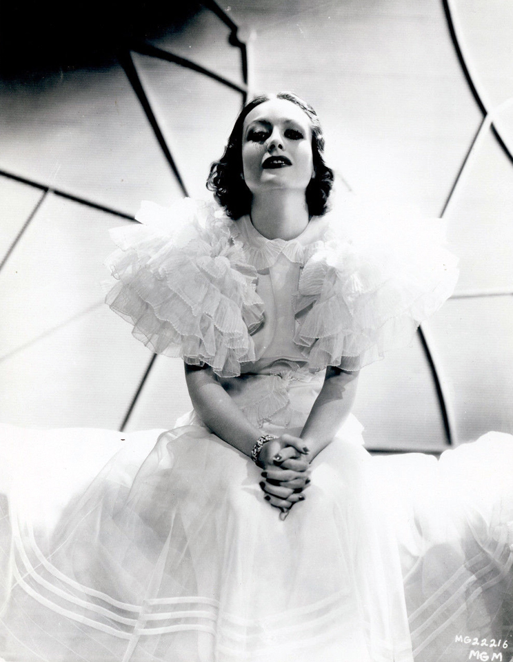 1932. 'Letty Lynton' publicity, with dress by Adrian.