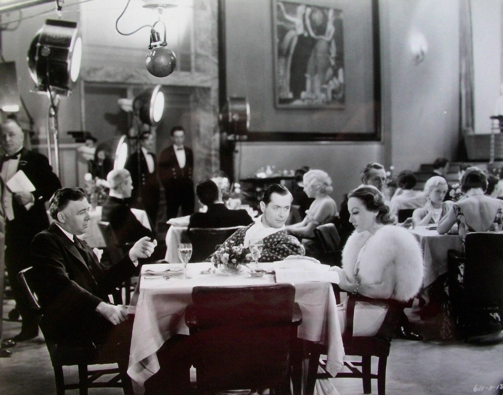 1932. On the set of 'Letty Lynton' with director Clarence Brown and Robert Montgomery.