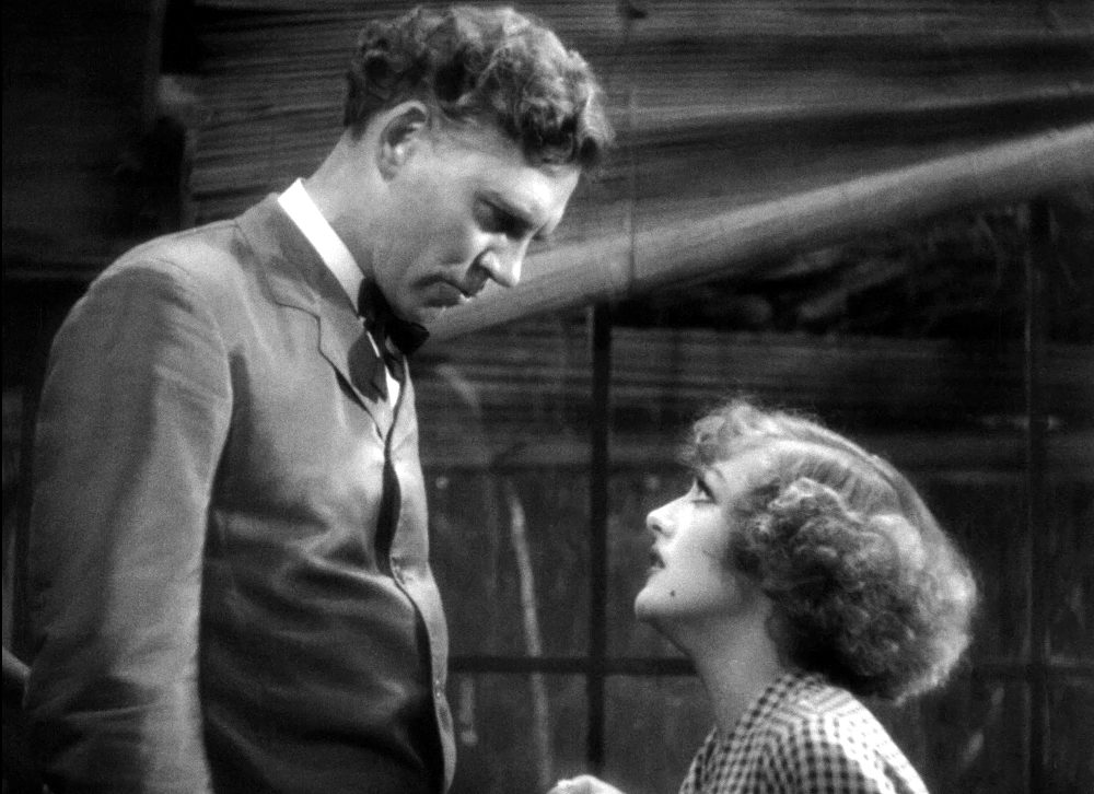 1932. 'Rain.' Screen shot with Walter Huston.