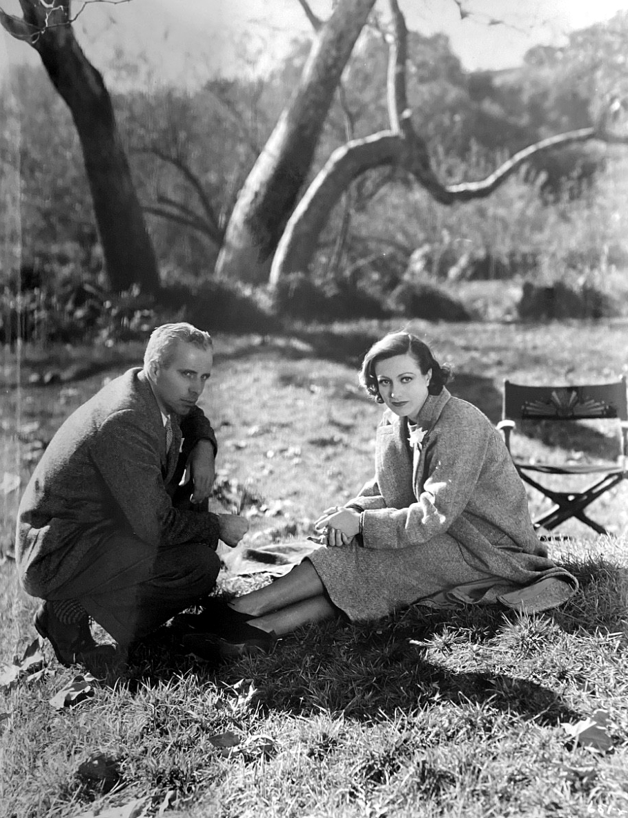 1933. On the set of 'Today We Live' with director Howard Hawks.