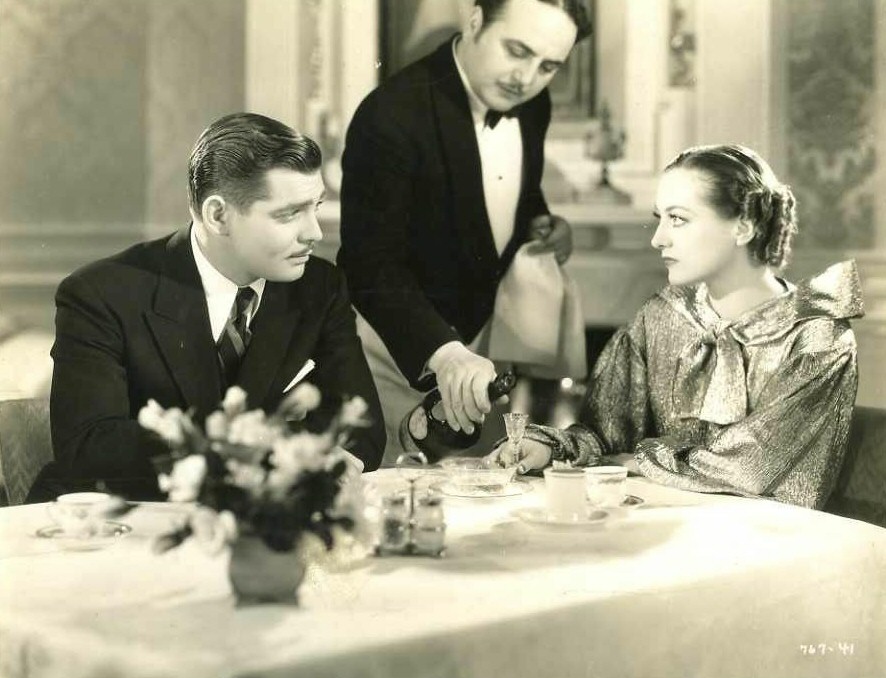 1934. 'Chained' film still. With Clark Gable.