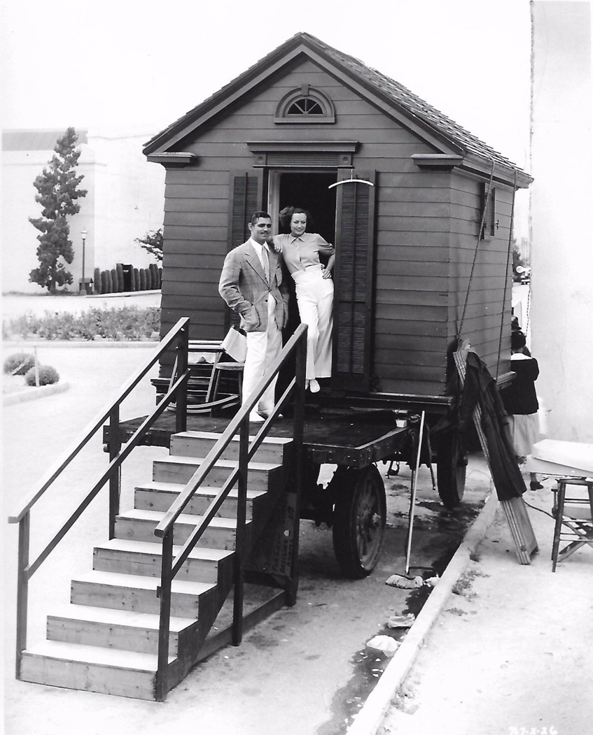 1934. On the set of 'Chained' with Clark Gable.