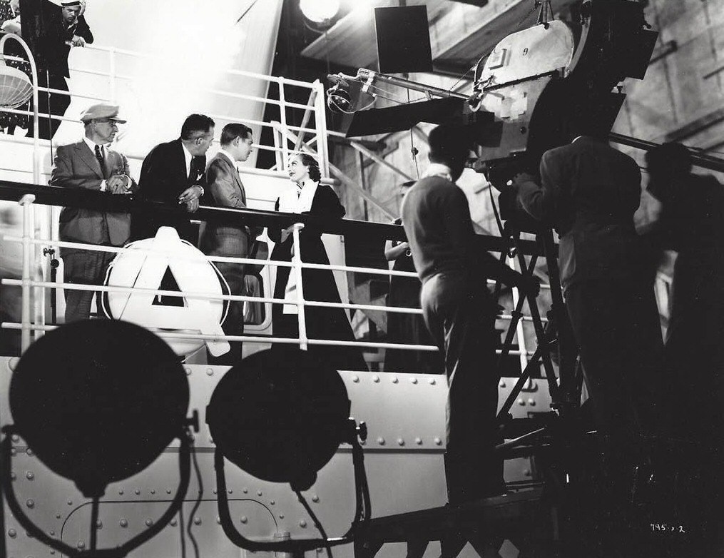 1934. 'Forsaking All Others' set.