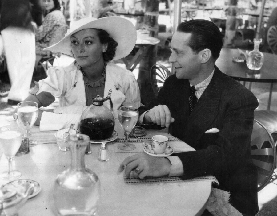 October 9, 1934, with Franchot Tone at the Ambassador Hotel's Lido pool