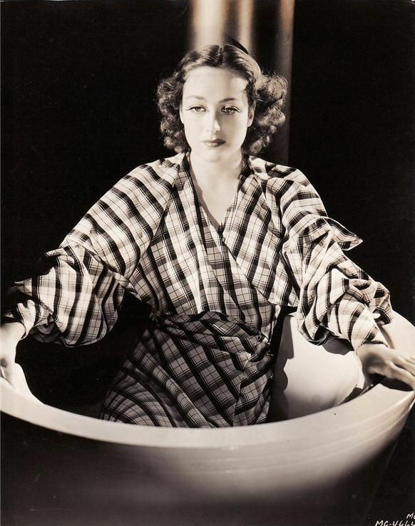 1935. Publicity for 'I Live My Life,' shot by Hurrell.