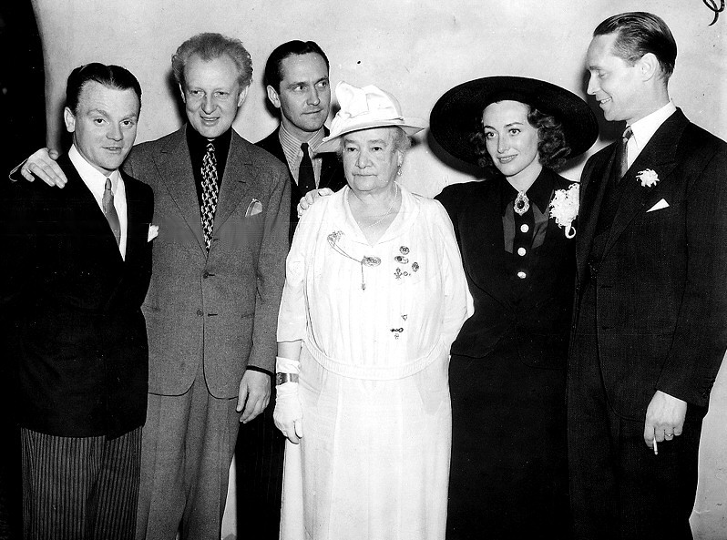 March 10, 1936. Reception for conductor Leopold Stokowski at LA's Ambassador Hotel. From left: James Cagney, Stokowski, Fredric March, unknown, Joan, Franchot Tone.