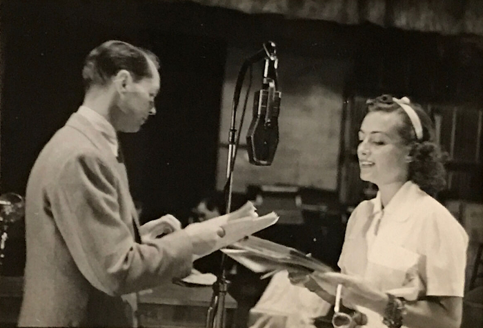 Rehearsing with Franchot Tone for the 7/27/36 Lux radio broadcast of 'Chained.'  (Shot by Charles Rhodes.)