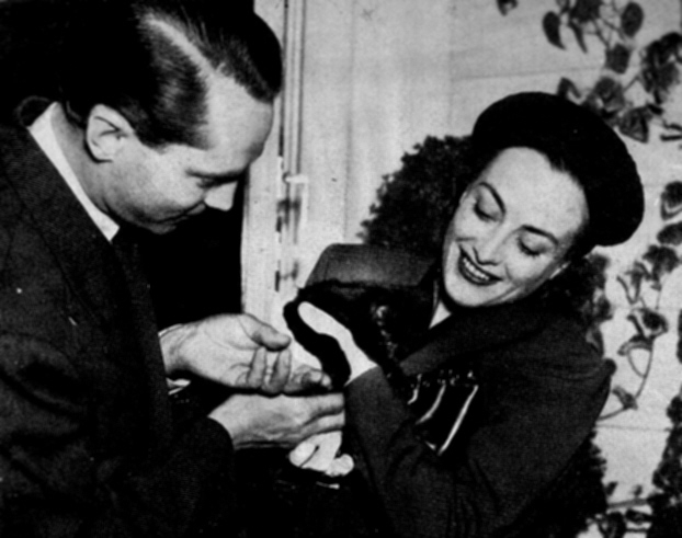 1936. Candid with Franchot Tone. (Thanks to Matt Treadaway.)