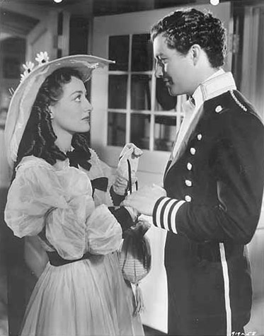 With Robert Taylor.