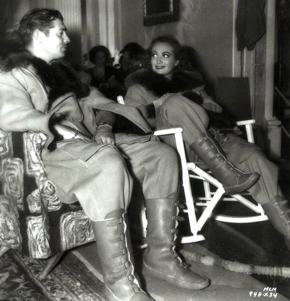 1936. On the set of 'Love on the Run' with Clark Gable.