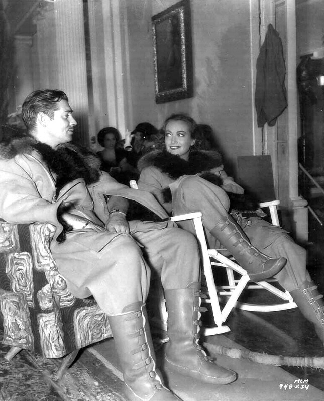 1936. On the set of 'Love on the Run.'