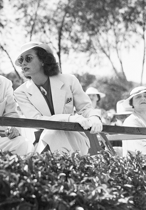 July 1936 at a polo match with Barbara Stanwyck and Franchot Tone.