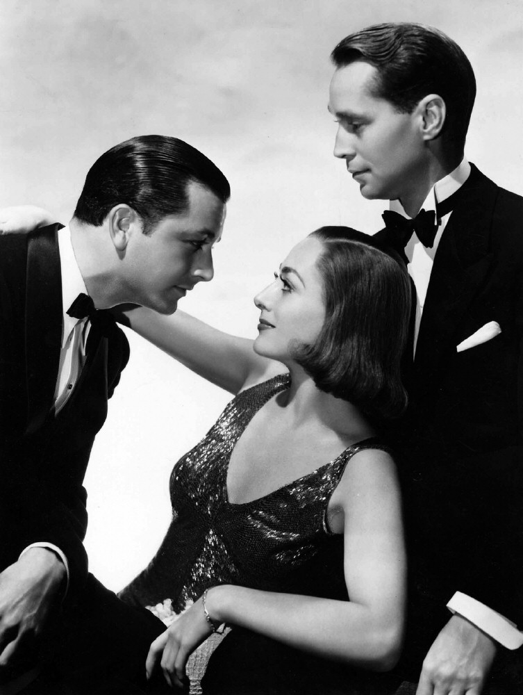 1937. 'The Bride Wore Red' publicity with Robert Montgomery and Franchot Tone.