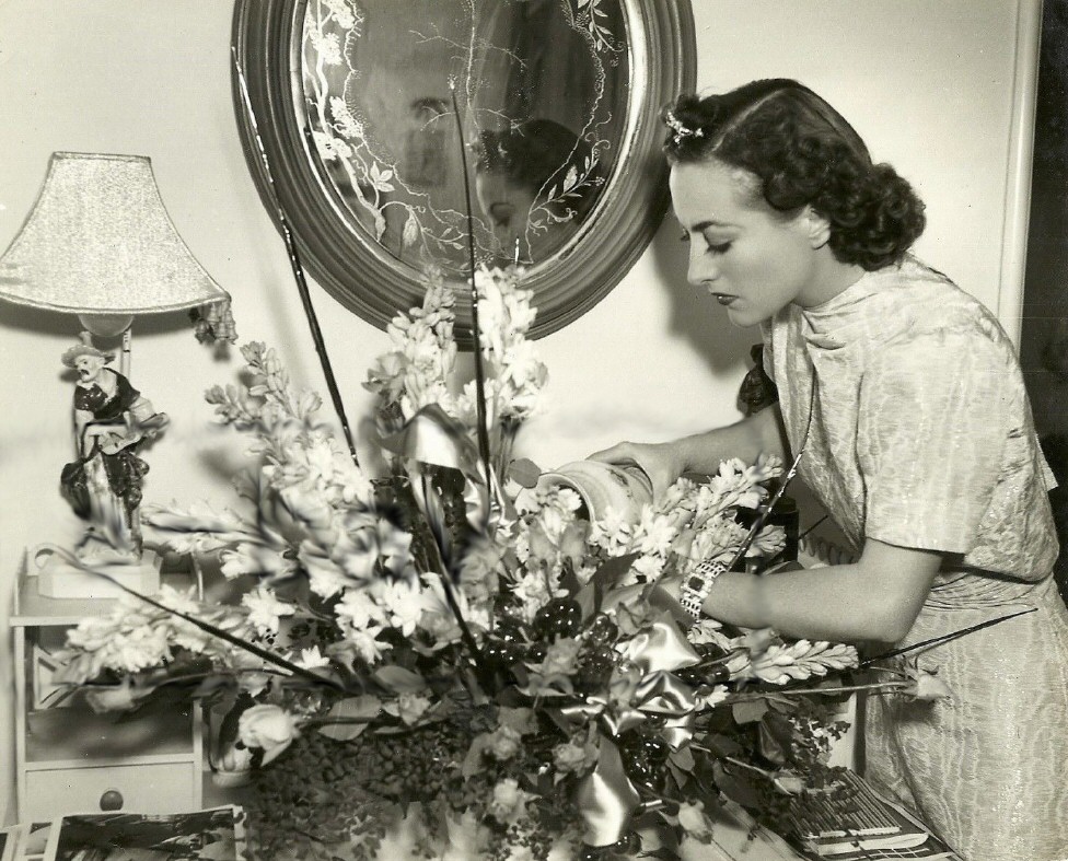 1937. On the set of 'The Last of Mrs. Cheyney' shot by William Grimes.