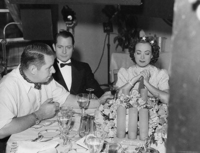 1937. On the set of 'The Last of Mrs. Cheyney' with director Richard Boleslawski and Robert Montgomery.