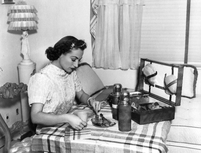 1937. In her dressing room on the set of 'The Last of Mrs. Cheyney.'