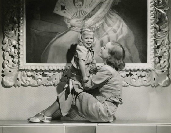 1937 with niece Joanie LeSueur. Shot by Hurrell. (Thanks to Bryan Johnson.)