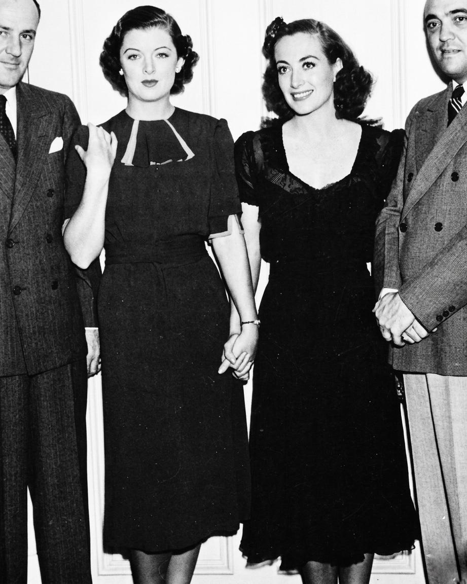 1937. On the set of Myrna Loy's 'Man-Proof,' with J. Edgar Hoover (right) and boyfriend Clyde Tolson. (Thanks to Jarrett for this larger photo.)