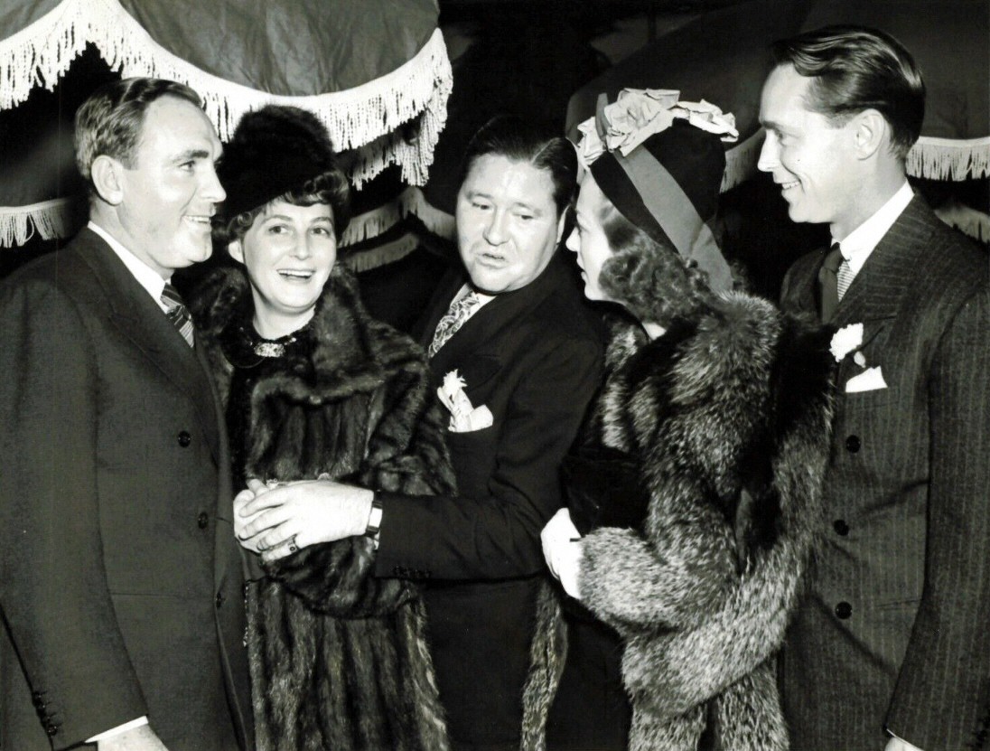 November 1937 party for director Frank Borzage. With Pat O'Brien, wife, Jack Oakie, and husband Franchot.